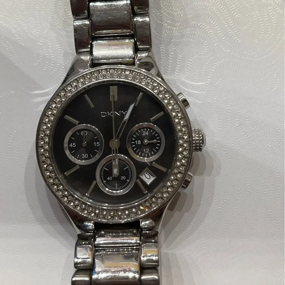 DKNY womens silver watch large dial rhinestone bezel